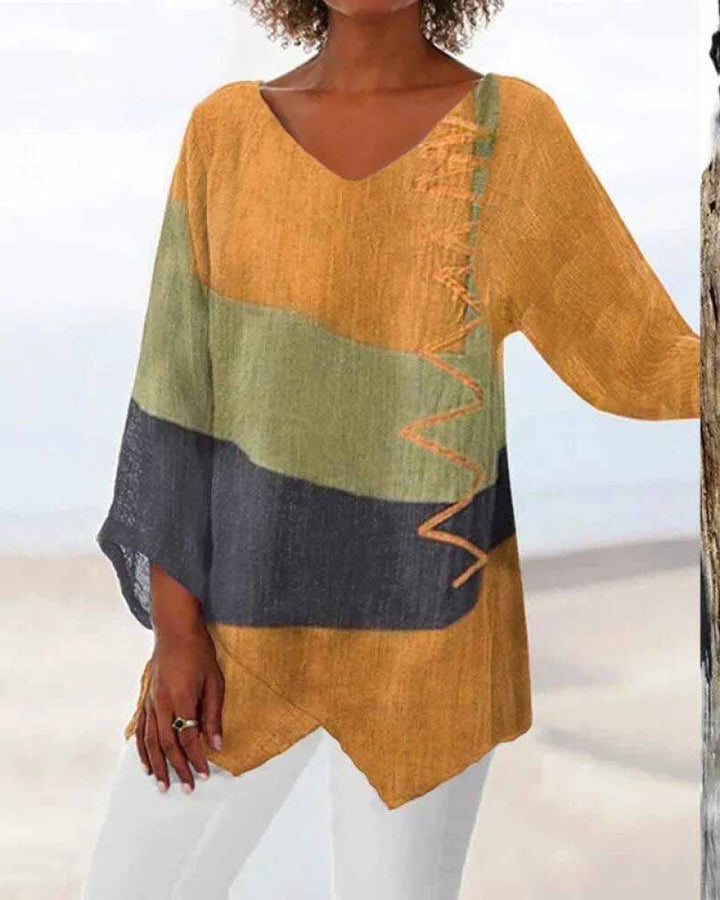 Versatile Blouse with Adaptable Fit for Tucked or Untucked Wear