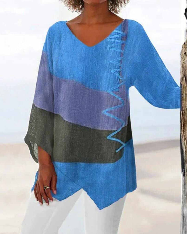 Versatile Blouse with Adaptable Fit for Tucked or Untucked Wear