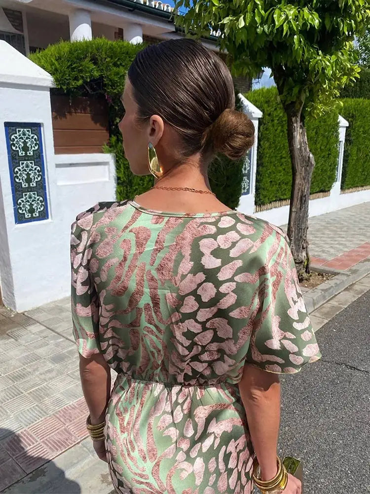 Wrap Maxi Dress with Deep V-Neckline and Floor-Length Design