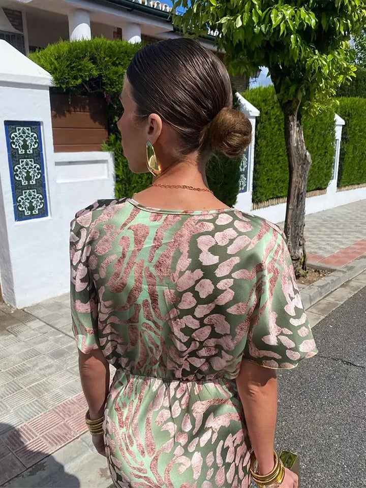 Wrap Maxi Dress with Deep V-Neckline and Floor-Length Design