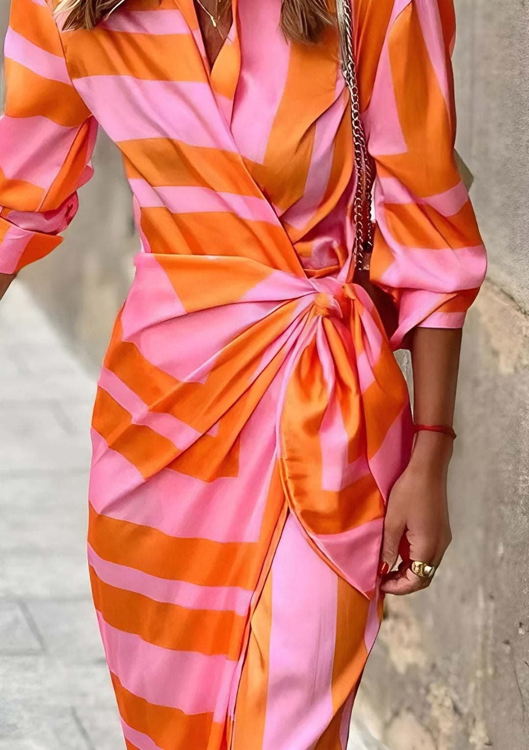 Wrap Dress with Patterned Textile and Adjustable Closure