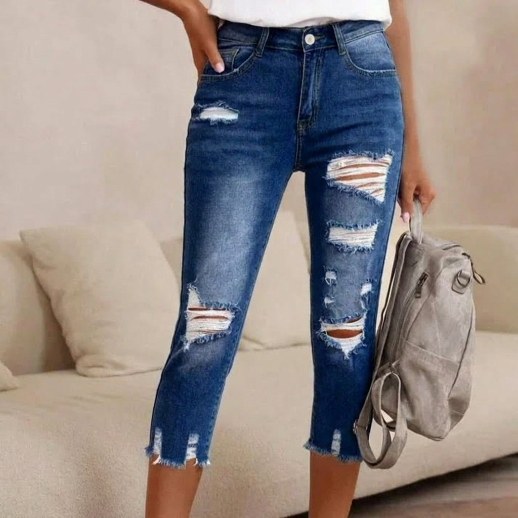 Distressed Jeans with Raw Hem and Washed Finish