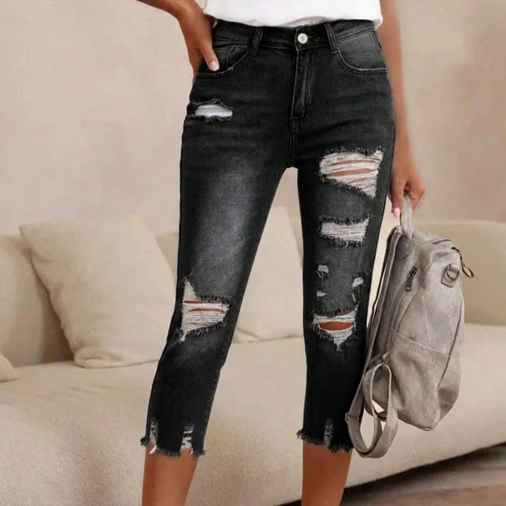 Distressed Jeans with Raw Hem and Washed Finish
