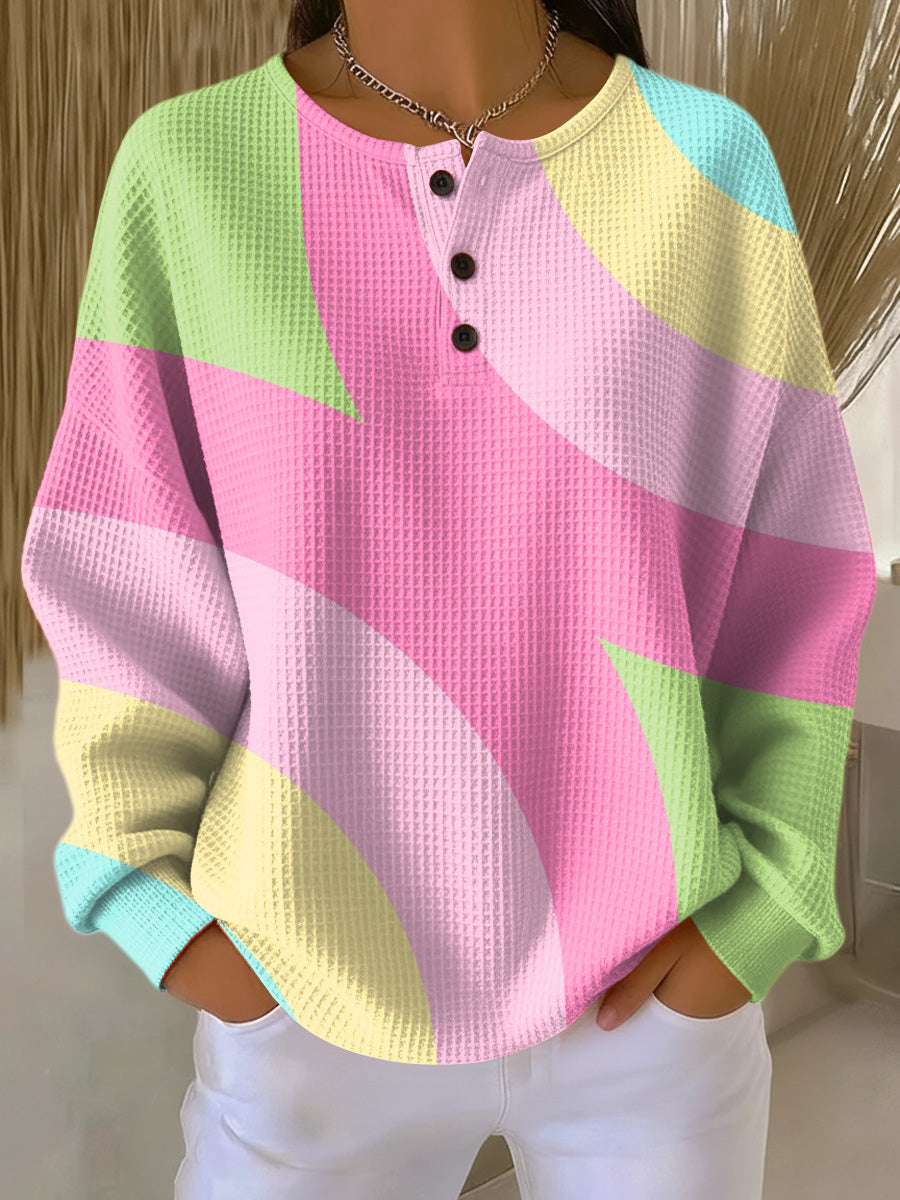 Textured Knit Sweater with Abstract Geometric Pattern and Button-Neck Detail