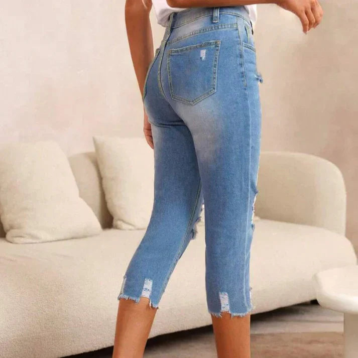 Distressed Jeans with Raw Hem and Washed Finish