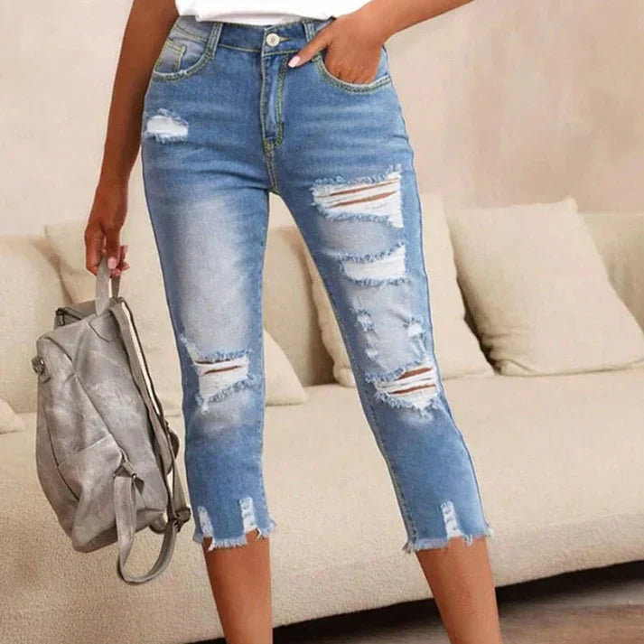 Distressed Jeans with Raw Hem and Washed Finish