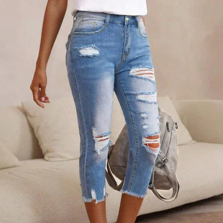 Distressed Jeans with Raw Hem and Washed Finish