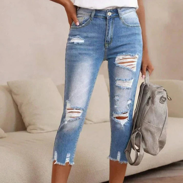 Distressed Jeans with Raw Hem and Washed Finish